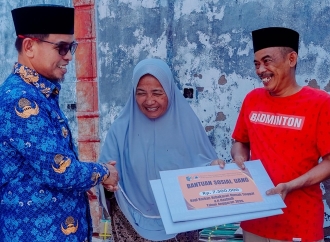 Sirajudin Lasena Bubker & Serahkan Sembako ke Pengurus Alkhairaat Bolmong Raya